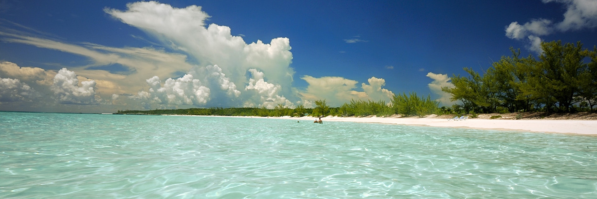 crystal waters at the white sand beach in half moon cay