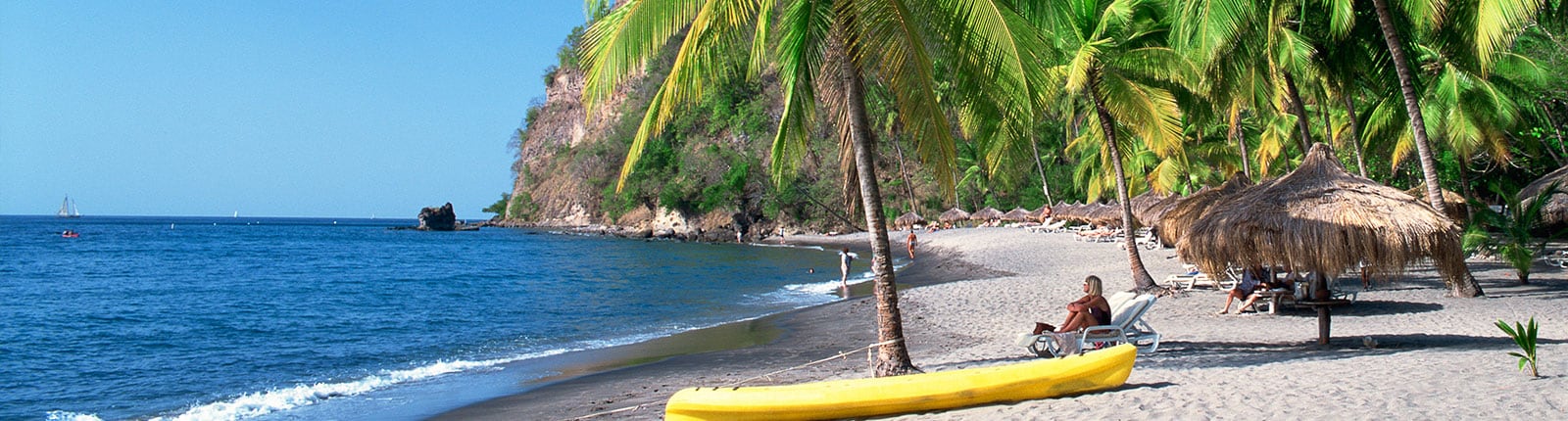 Sitting on the beach with a kayak in St. Lucia