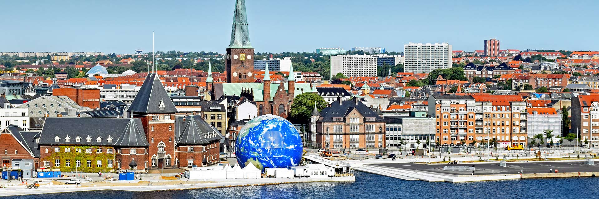 a giant globe of earth is located in the city of aarhus