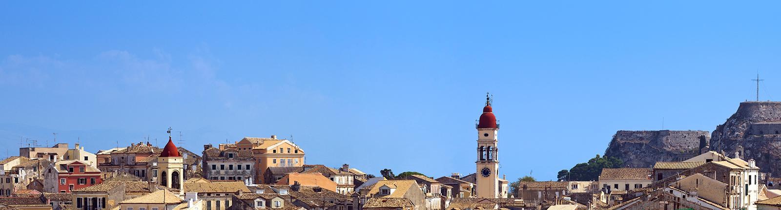 Roof top view in Old Town set against the blue sky in Corfu, Greece