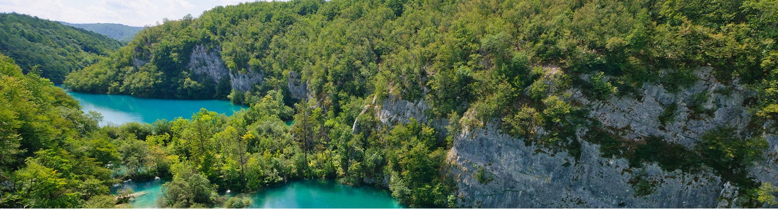 The rocky hillsides and blue waters in the Dinaric Alps near Dubrovnik, Croatia