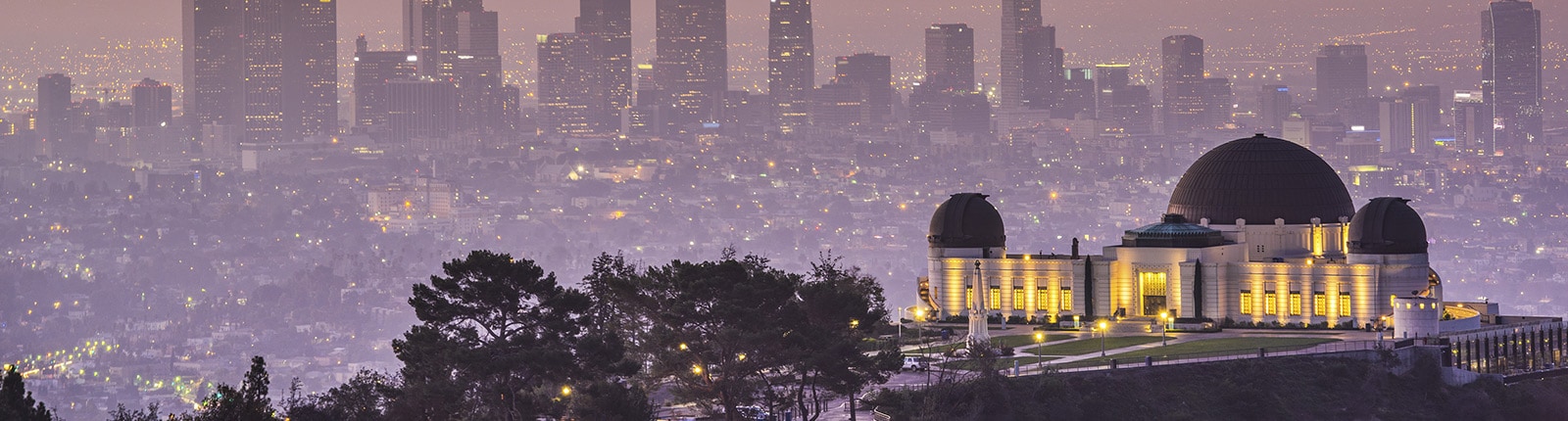 Griffith Observatory set against the LA skyline at dusk