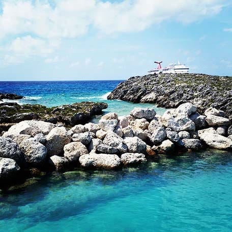Rocks along the water of Half Moon Cay