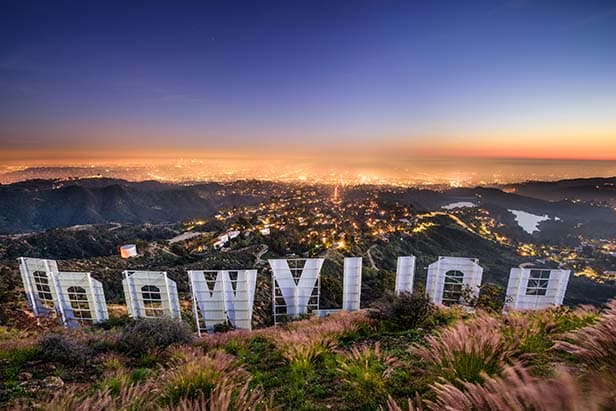 sunset view of Los Angeles from behind the Hollywood sign 