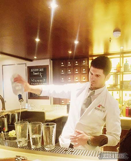 One of Vista’s mixologists at the Alchemy Bar making some drinks
