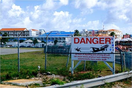 Danger sign at Maho beach for planes flying overhead