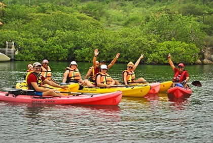 group of people kayaking along the Spanish Waters in Curacao
