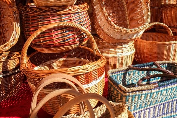 handmade straw baskets in different colors and shapes from dominica