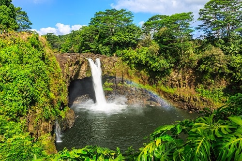 aerial view of the amazing hilo waterfalls in hawaii during a bright sunny day 
