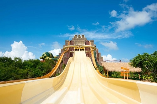 large, yellow slide at the maya adventure park in costa maya mexico 