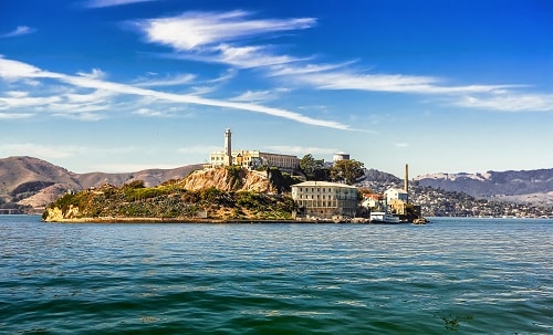 view of alcatraz island in san francisco from a boat in the bay
