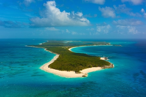 aerial view of an island in the bahamas during a bright sunny day 