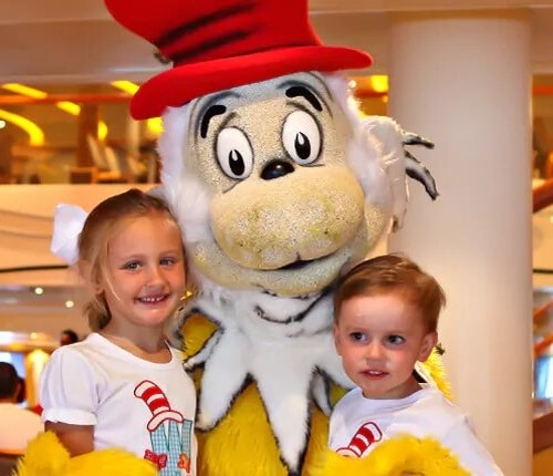 children meeting a dr seuss character at the green eggs and ham breakfast