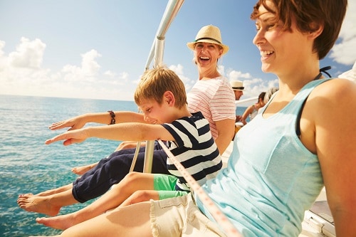 family on a catamaran in the caribbean