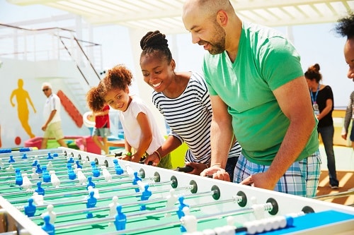 family playing foosball together in sportsquare