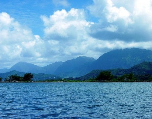 a landscape view of many mountains and bodies of water in hawaii