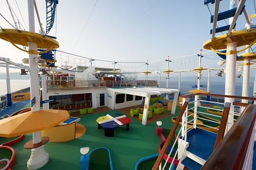 the interior of sportsquare onboard a carnival ship