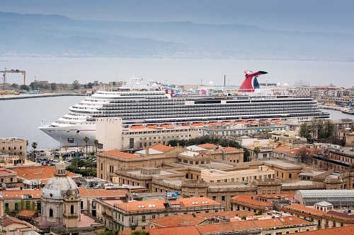 carnival horizon pulling into the port of messina in italy