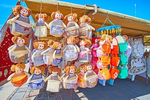 colorful textile dolls at a marketplace in malta