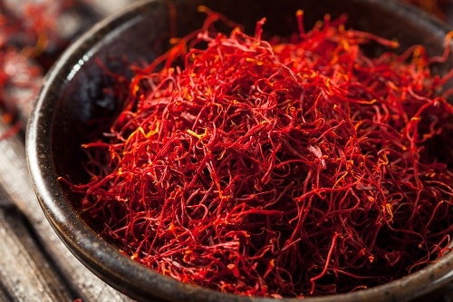 a bowl of raw, organic, red saffron
