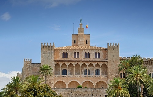 a full view of the royal palace of la almudaina in palma de mallorca
