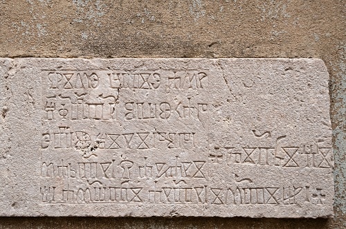 a slab containing glagolitic language in rijeka, croatia