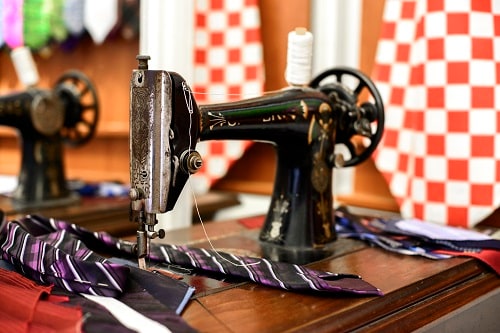 an antique sewing machine with ties