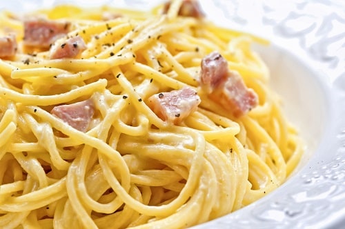 a close-up of carbonara pasta