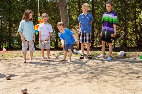 children playing a round of petanque