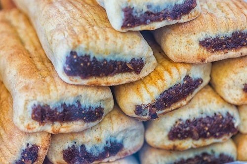 a pile of imqarets, a sweet maltese pastry with date filling
