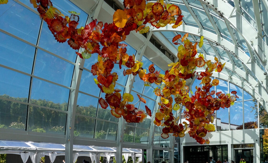 Landscape view of the Chihuly Garden glass structures.