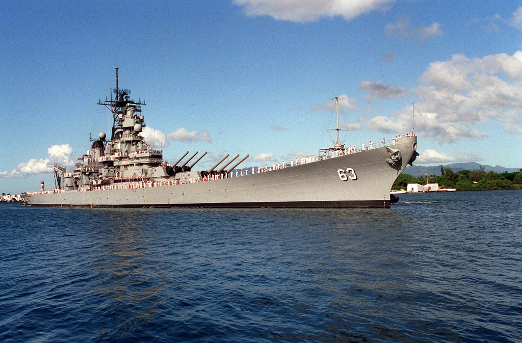 The battleship USS Missouri (BB-63) arrives in Pearl Harbor’s port to commemorate Survivor’s Day.